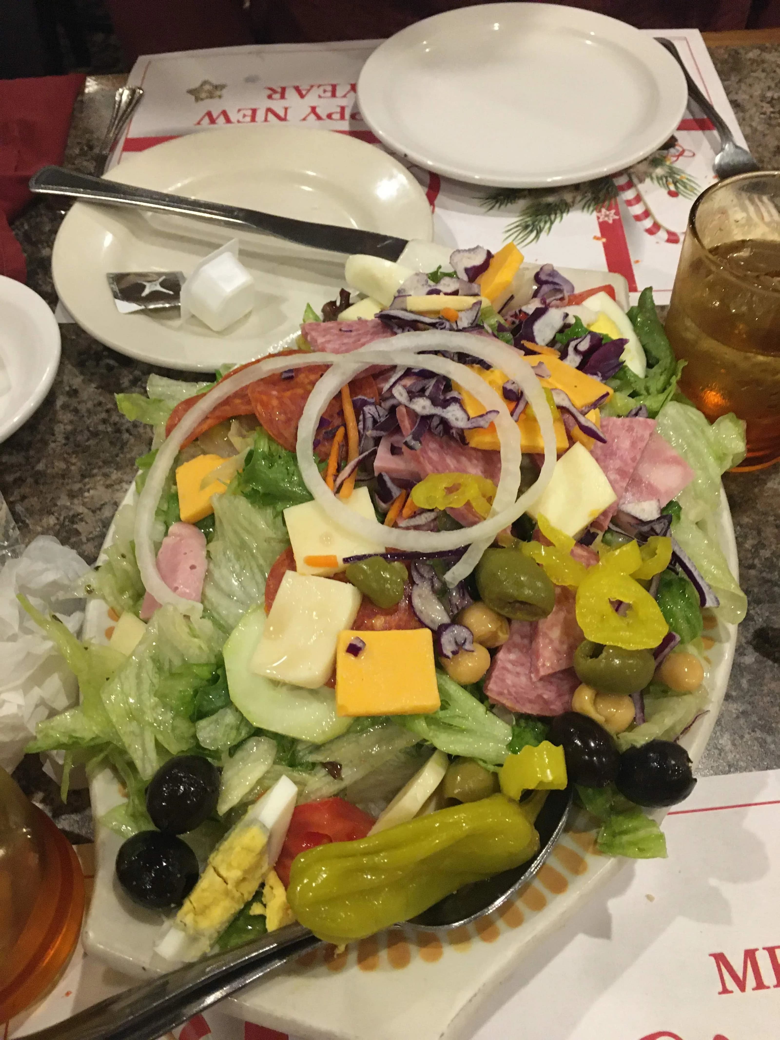 Antipasto salad with meats, cheeses, and olives